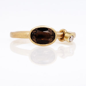 Ring in motion with a smoky quartz